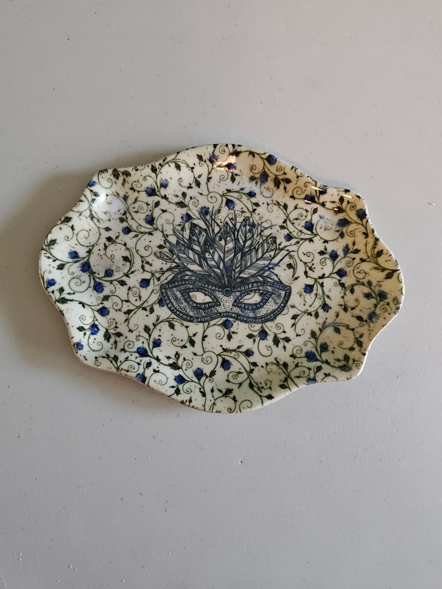 Floral mask plate