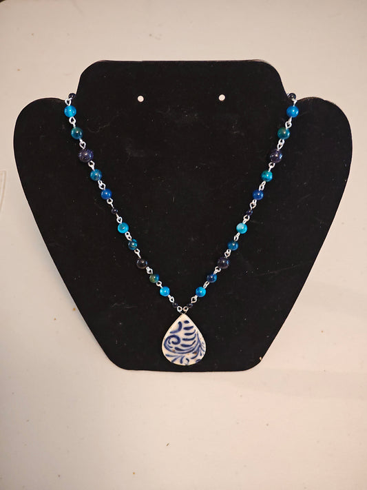 Blue Beaded Necklace with Blue Scrollwork Pendant - C108
